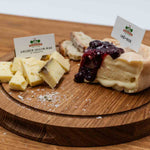 Servierbrett mit Glocke