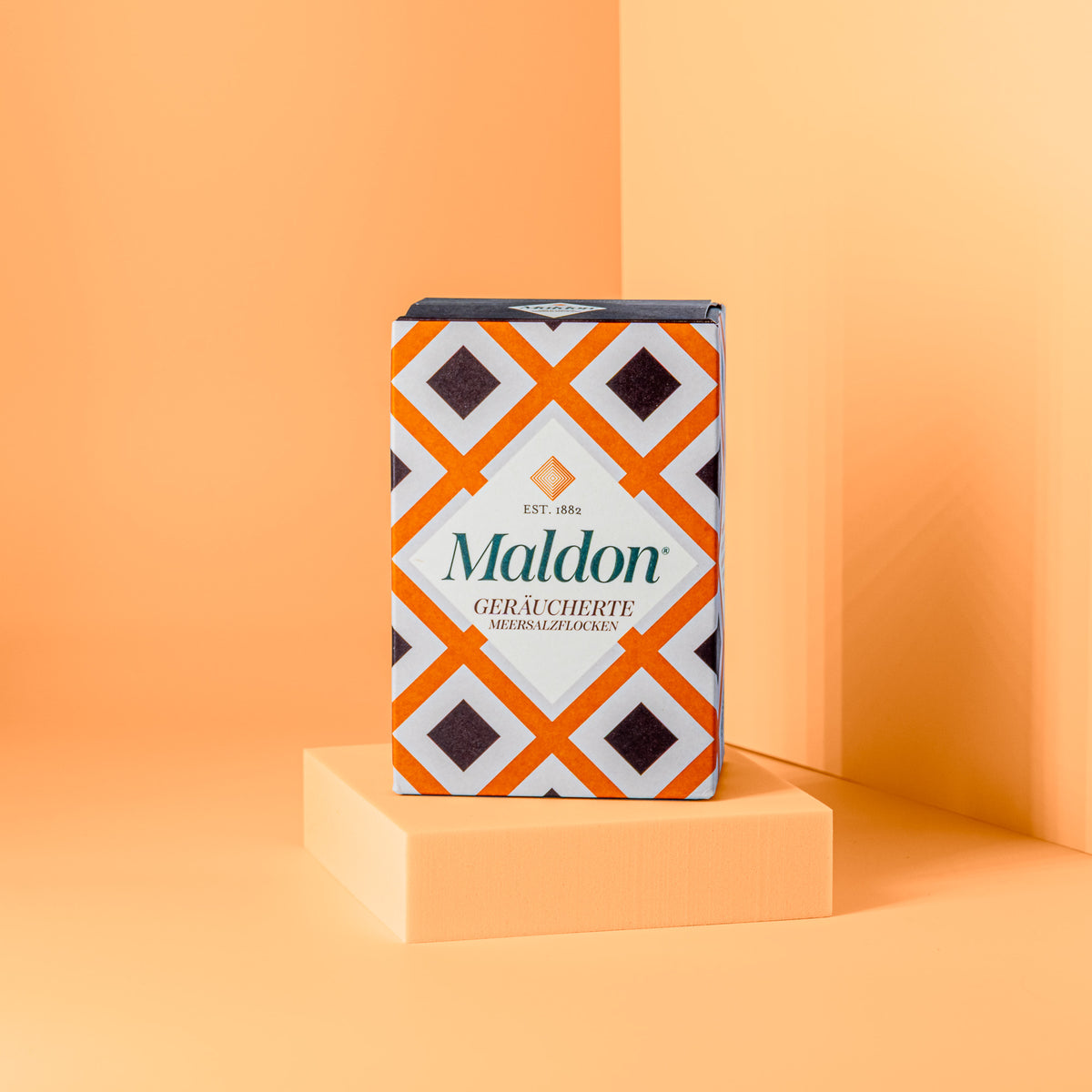 Orangefarbene Packung geräucherte Meersalzflocken von Maldon