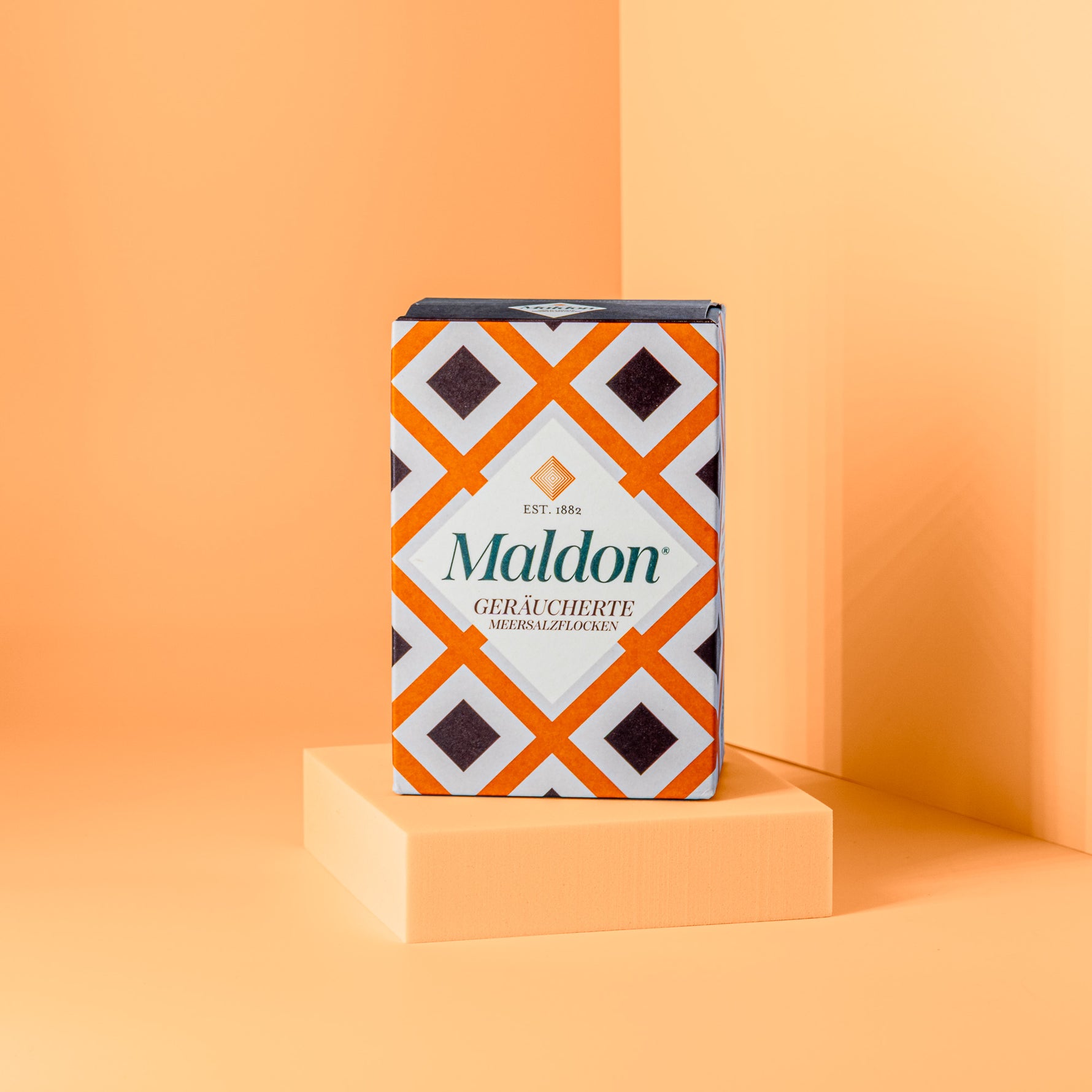 Orangefarbene Packung geräucherte Meersalzflocken von Maldon
