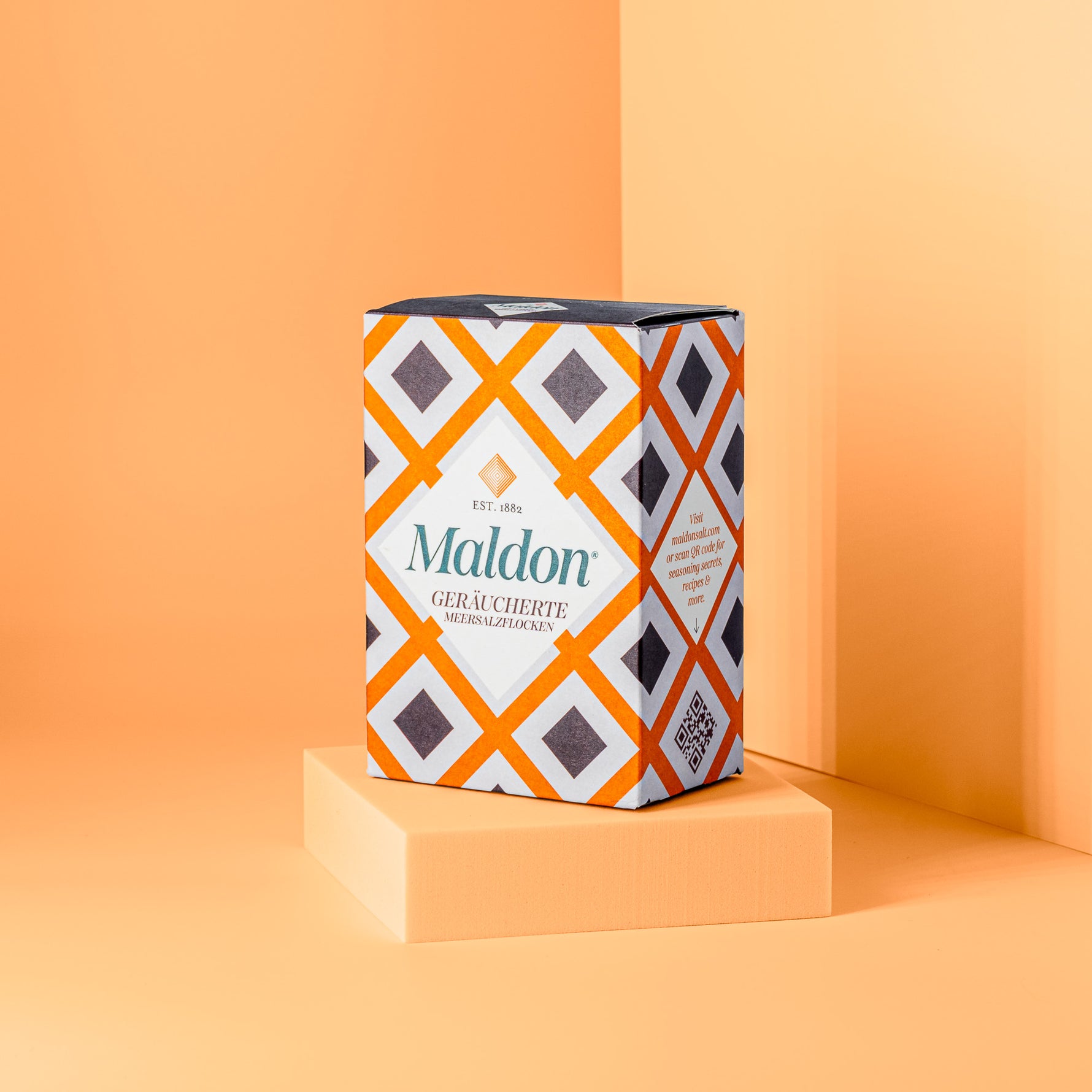 Orangefarbene Packung geräucherte Meersalzflocken von Maldon